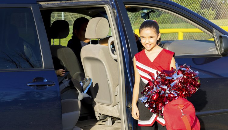 Hispanic Dad Picks Up Daughter After Cheerleader Practice