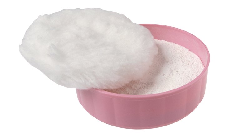 Powder puff and powder in container