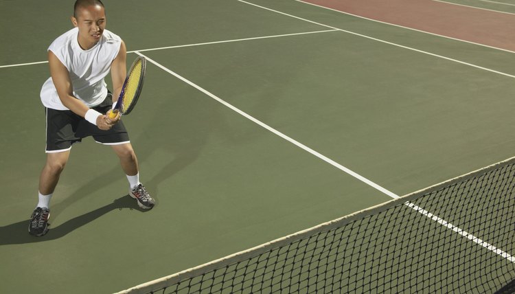 Young man playing tennis