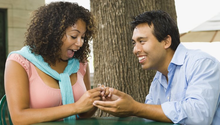 Traditionally a man proposes to a woman.