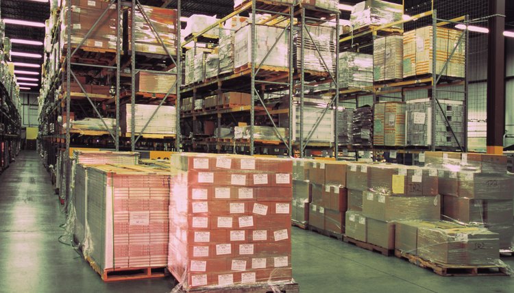 Interior of warehouse with pallets and shelves of goods
