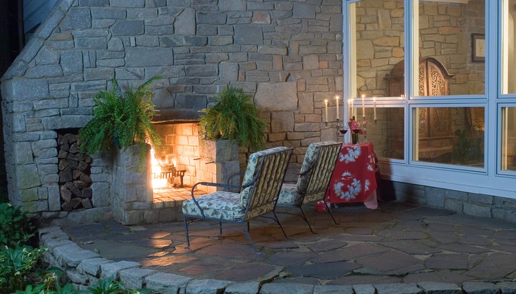 Exterior fireplace on upscale house