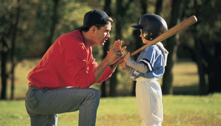 Man coaching child