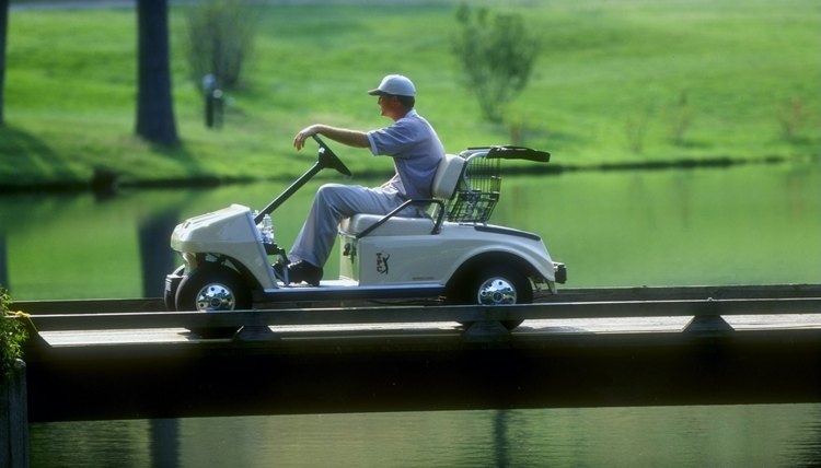 Casey Martin driving his cart during a tournament.
