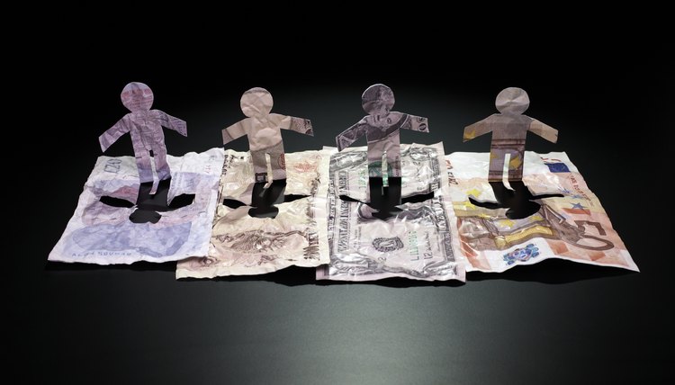 paper men of various currencies standing together