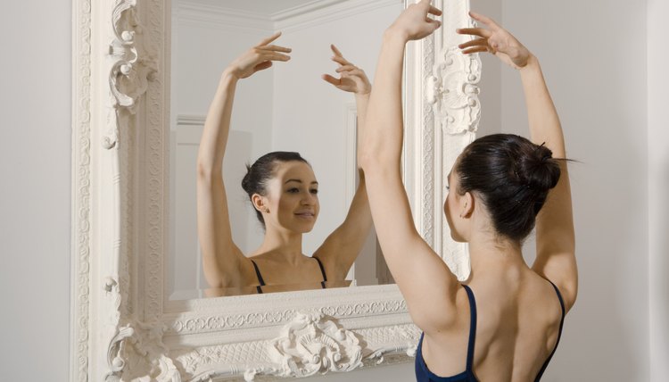 Ballerina posing in mirror