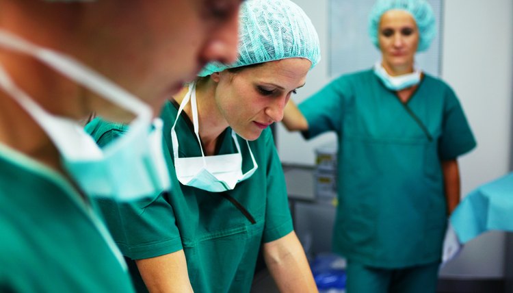 A surgical tech must stay focused and calm in the operating room.