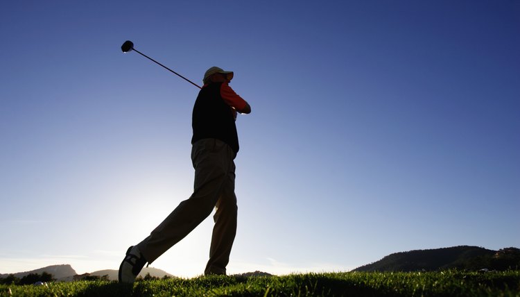 Male golfer, low angle view
