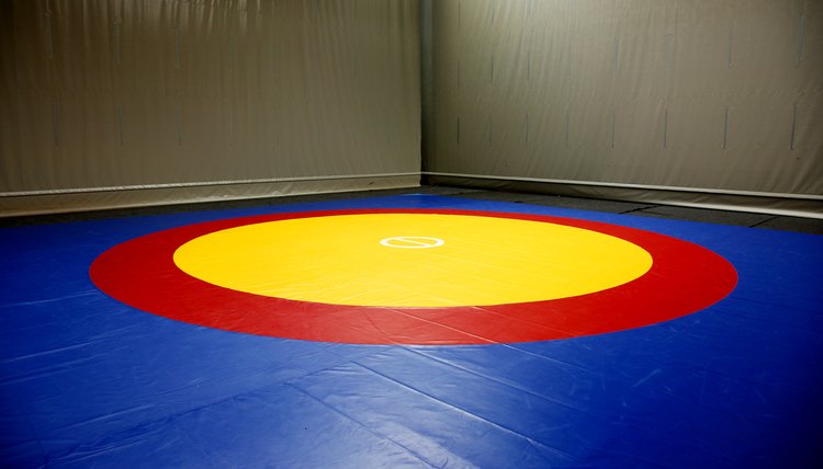 The wrestling mat into the hall