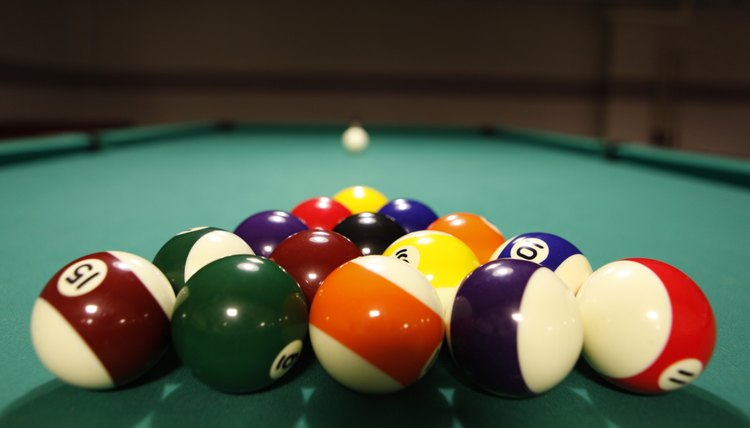 Billard Balls Cue And Billiard Triangle In A Pool Table Stock