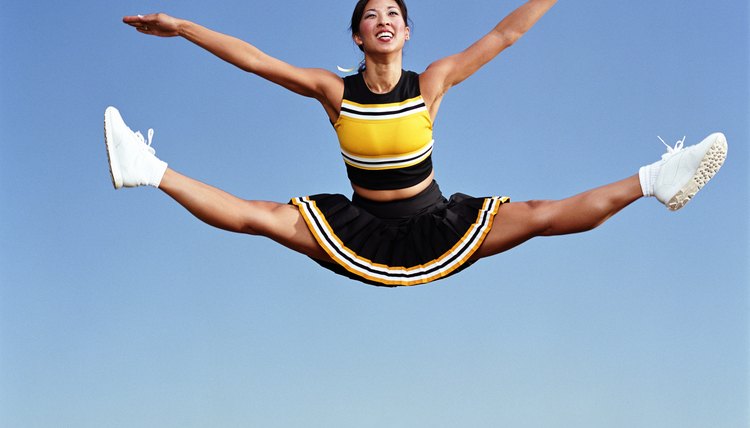 Cheerleader doing splits in mid air