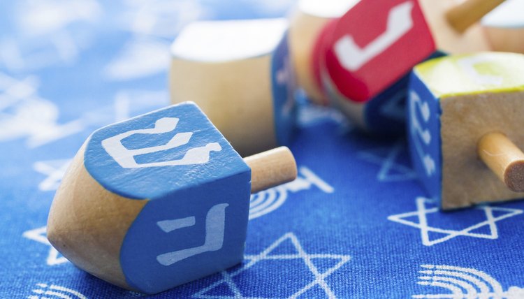 What do the symbols on a dreidel mean