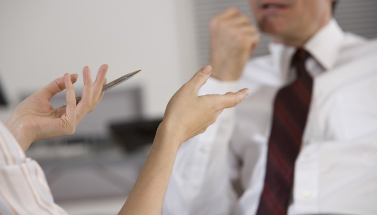 Businessperson gesturing with hands