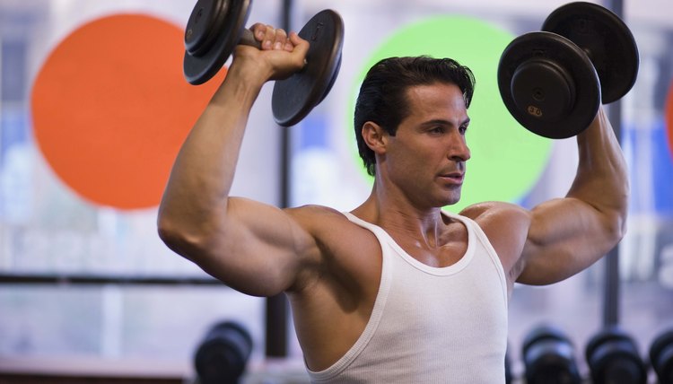 Man lifting weights at gym