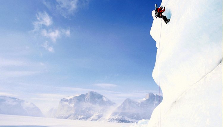 Low angle view of a person climbing a mountain