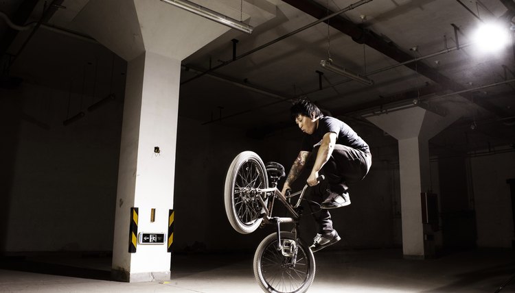Man performing jump on BMX bike