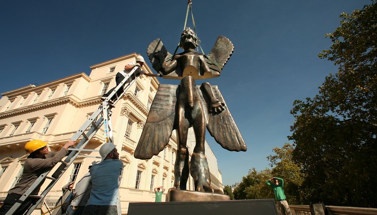 A sculpture of the Mesopotamian god, Pazuzu, on display outside of an art museum in London.