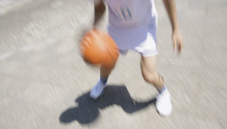 Young Adult Man Playing Basketball
