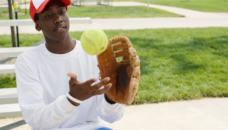 Boy catching softball