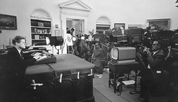 President John F. Kennedy gives a televised speech to the nation about the strategic blockade of Cuba, and his warning to the Soviet Union during the Cuban missile crisis October 24, 1962 in Washington, DC.