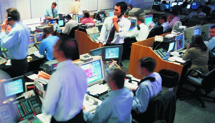Stock brokers working at stock exchange