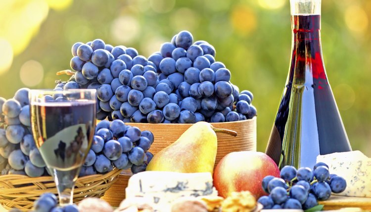 Classic Roman banquet foods include cheeses and grapes.