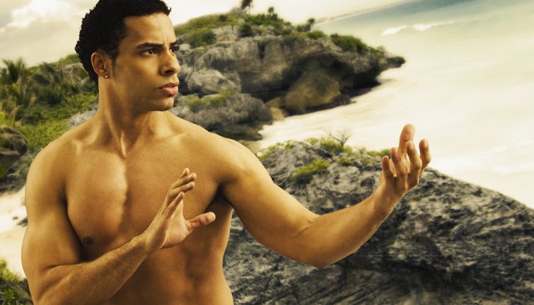 Mixed Race man practicing Tai Chi