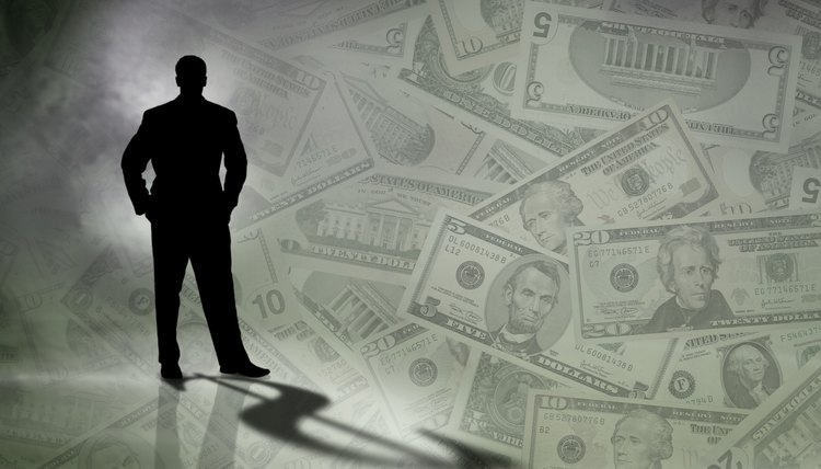 Silhouette of man with money