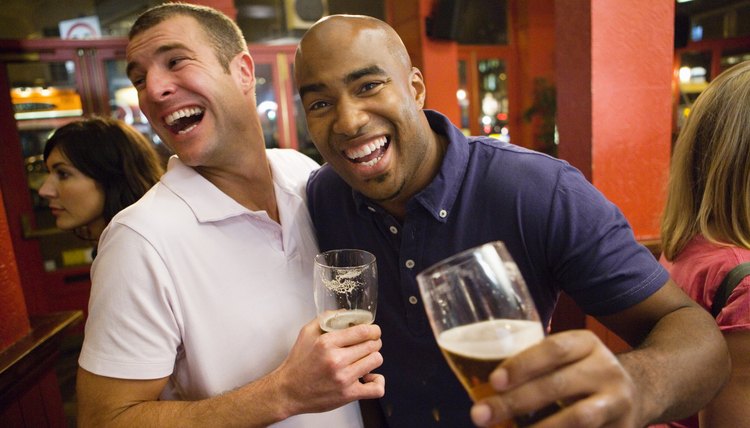 Laughing men with beers