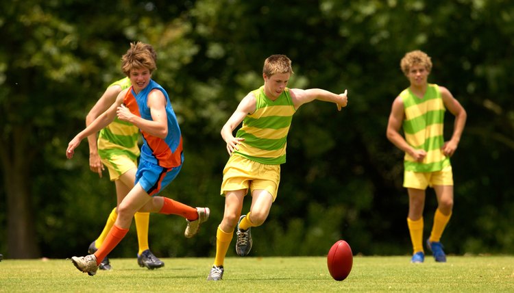 Player about to kick an Australian football