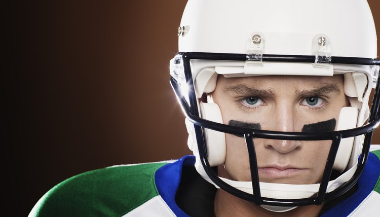 Football player wearing helmet