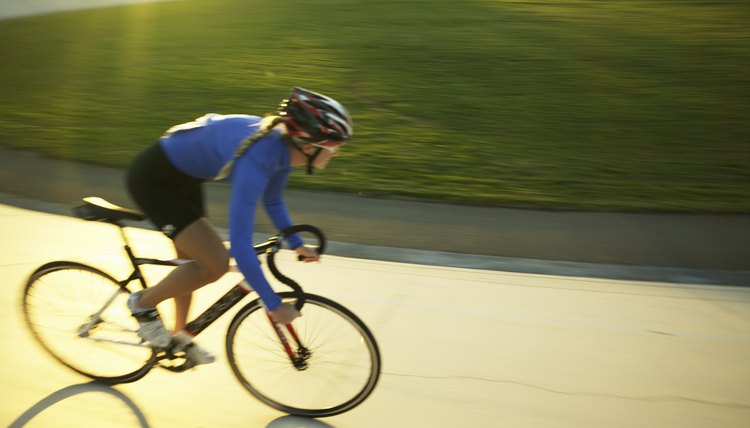 Cyclist in action on velodrome track