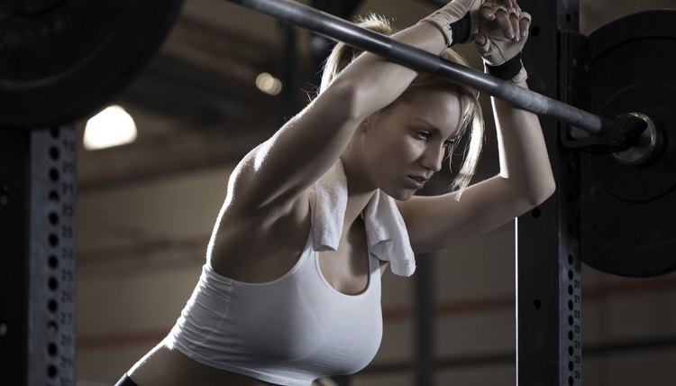 Woman training at crossfit center