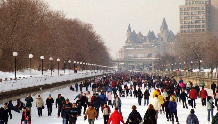 Winterlude skaters on Rideau Canal skate-way, Ottawa Canada.