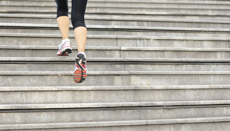 Runner athlete running on stairs.