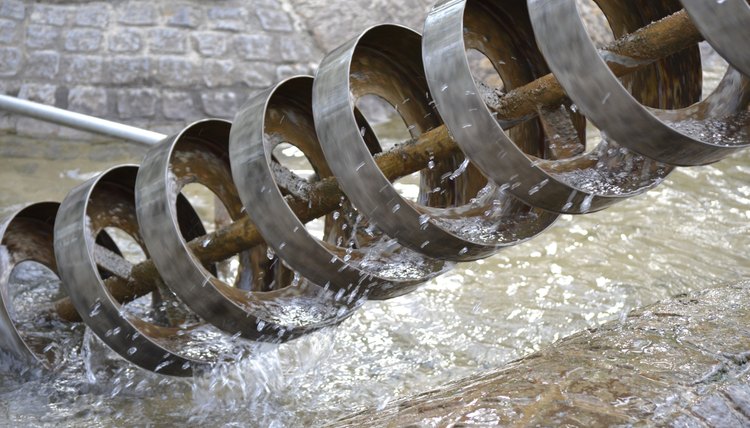 The Archimedes screw works today to siphon water from lower to higher levels.