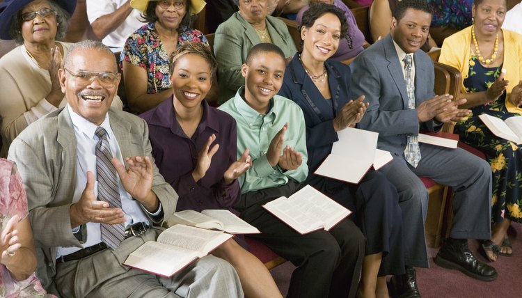 A congregation is clapping at church.