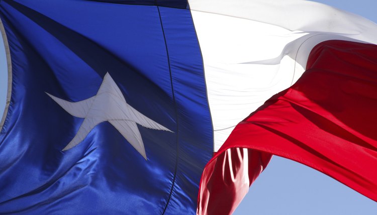 The flag of Texas blows in the wind.