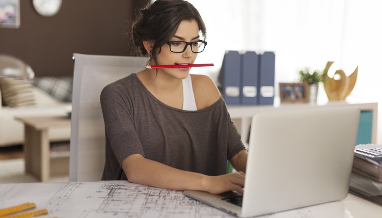 An adjustable laptop desk or stand ensures the screen is at eye level for less neck strain.