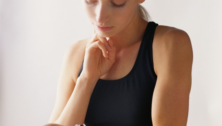 Woman Taking Her Pulse After Exercising