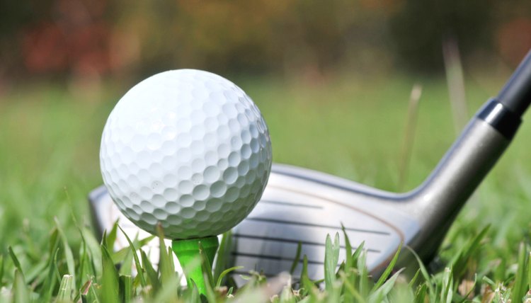 Close up of Golf Club and ball on the fairway