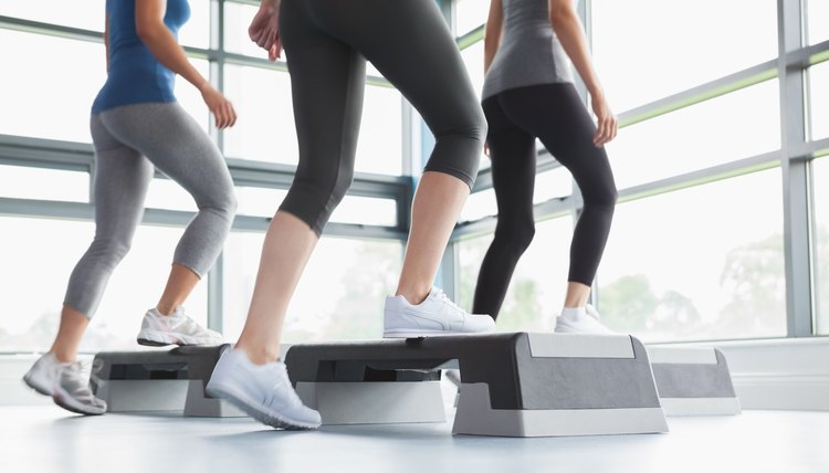 Three women doing aerobics