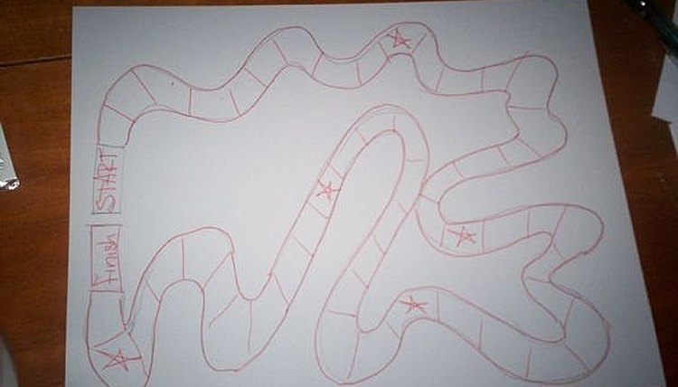 Draw a quick game board on cardboard or paper.