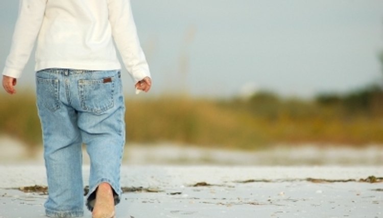 Walking barefoot on the beach