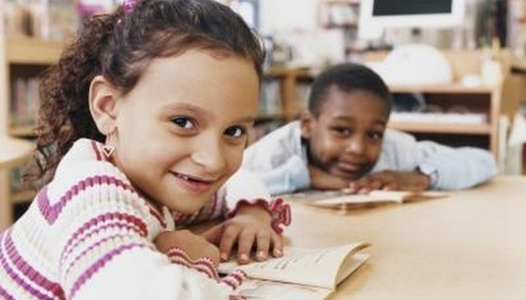 Children read independently in guided reading sessions.