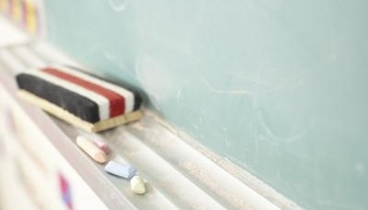 Writing the words on the chalkboard helps visual learners.