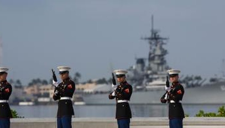 U.S. Marine Corp gun salute in front of the USS Missouri