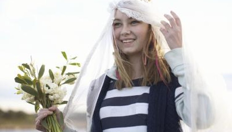 Teenage girl in bridal veil