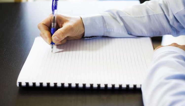 A student taking notes.