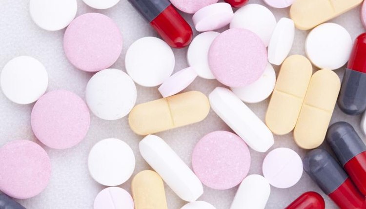 Assortment of medical pills on table